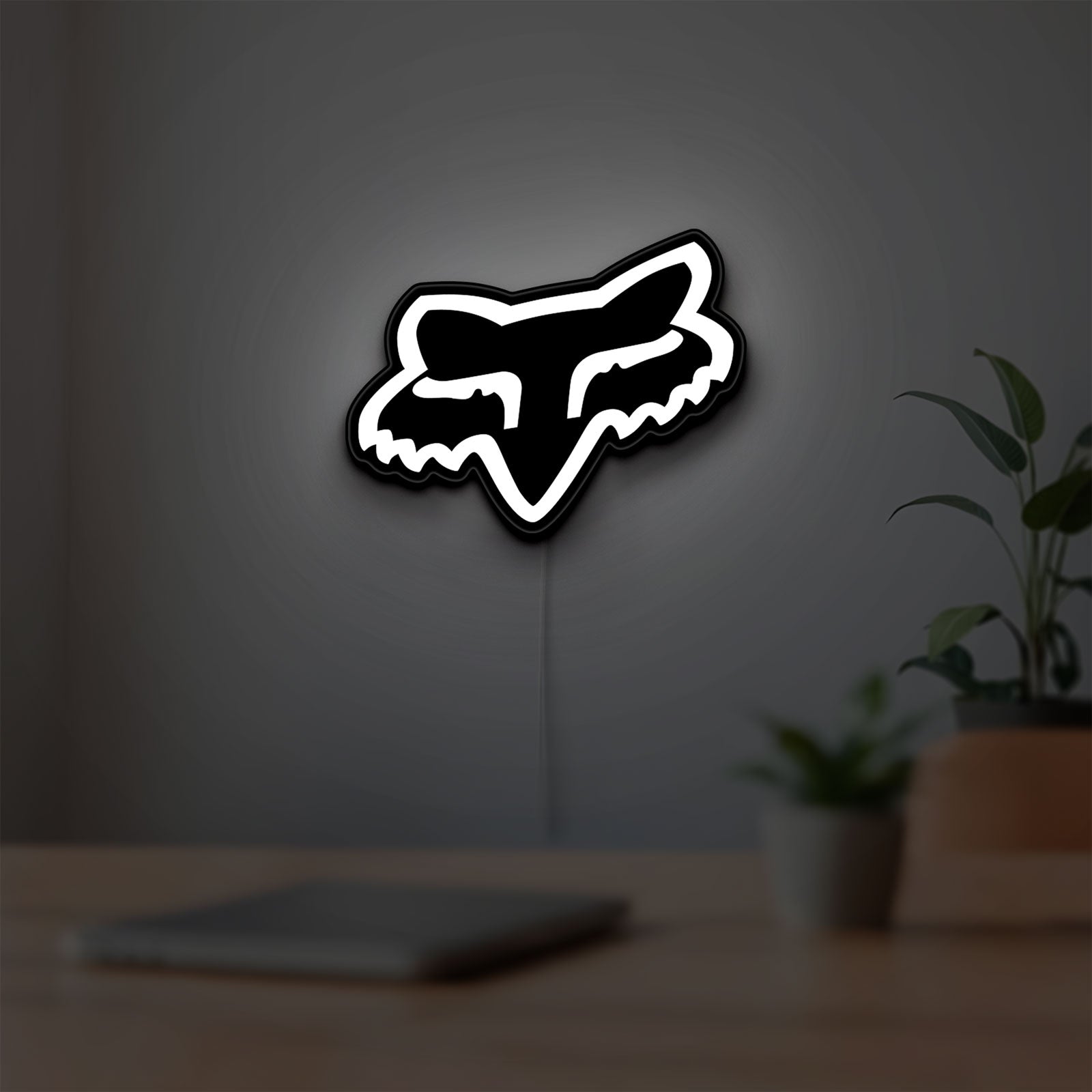 Fox Head LED lightbox hanging on a room wall with soft white light