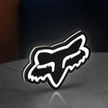 Fox Head LED lightbox standing on a desk from an angled side view with white glow