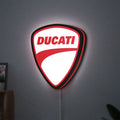 Ducati LED lightbox hanging on a wall with red glow