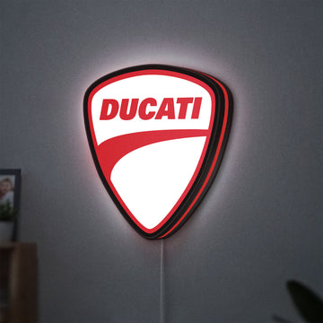 Ducati LED lightbox hanging on a wall with red glow