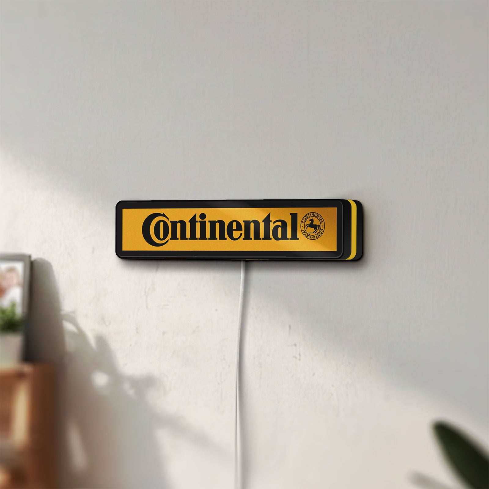 Unlit Continental LED lightbox mounted on a wall in daylight