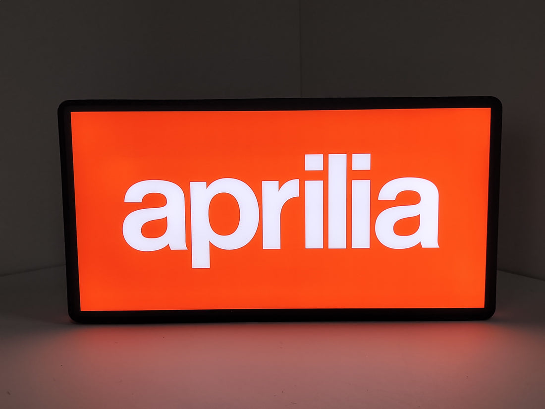 Illuminated front view standing of Aprilia Dimmable 3D LED Sign in 30cm, unique wall art for desk and room decor