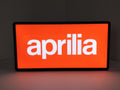 Illuminated front view standing of Aprilia Dimmable 3D LED Sign in 30cm, unique wall art for desk and room decor