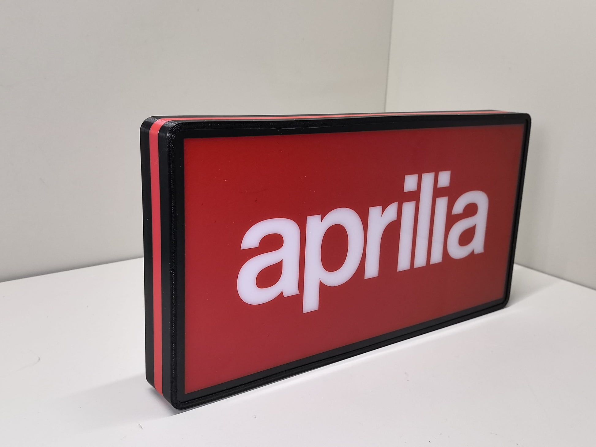 Aprilia Dimmable LED Sign (30cm) - Unlit angled details standing, unique wall art for desk and room decor
