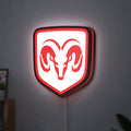 Dodge LED lightbox hanging on a wall with red glow