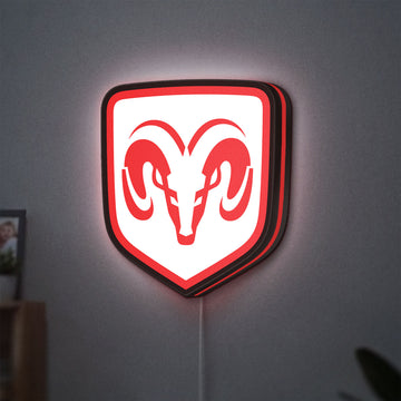Dodge LED lightbox hanging on a wall with red glow