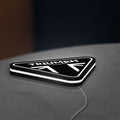 Triumph Motorcycles LED lightbox lying flat on a desk with white glow