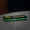 Monster Energy NASCAR Cup Series LED lightbox lying flat on a desk with green glow