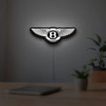 Bentley Motors LED lightbox hanging on a room wall with soft white light