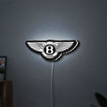 Bentley Motors LED lightbox hanging on a wall with white glow