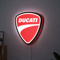 Ducati Sign LED lightbox hanging on a wall with red glow