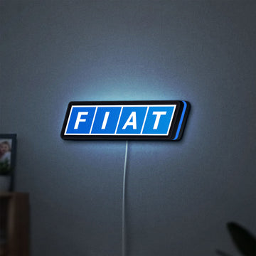 Fiat LED lightbox hanging on a wall with blue glow