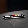Ralliart LED lightbox lying flat on a desk with white glow