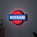 Nissan LED lightbox hanging on a wall with red glow