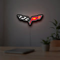 Corvette C6 LED lightbox hanging on a room wall with soft white light