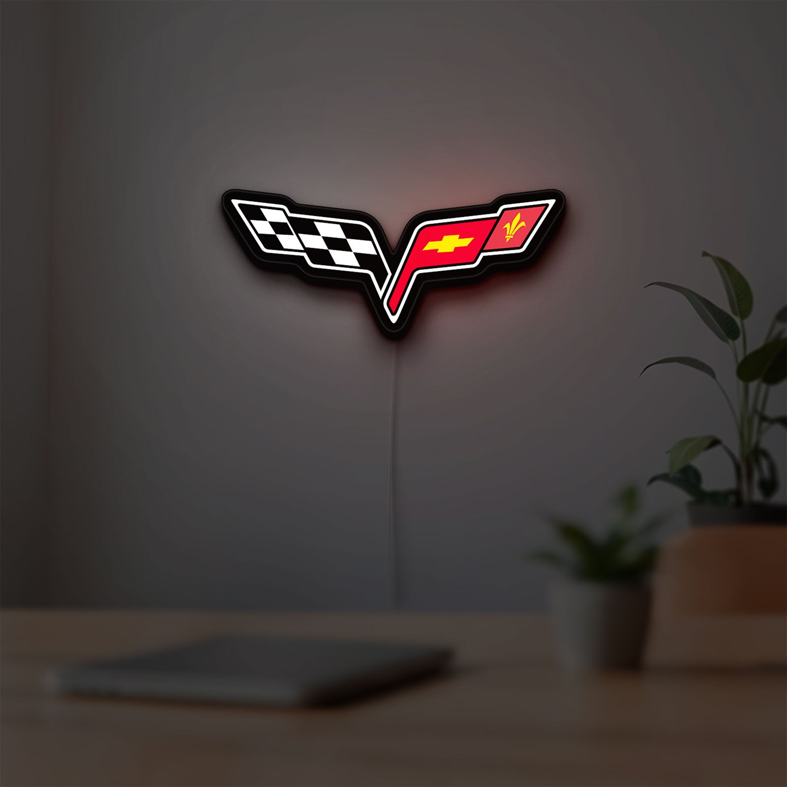 Corvette C6 LED lightbox hanging on a room wall with soft white light