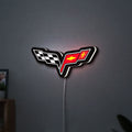 Corvette C6 LED lightbox hanging on a wall with white glow