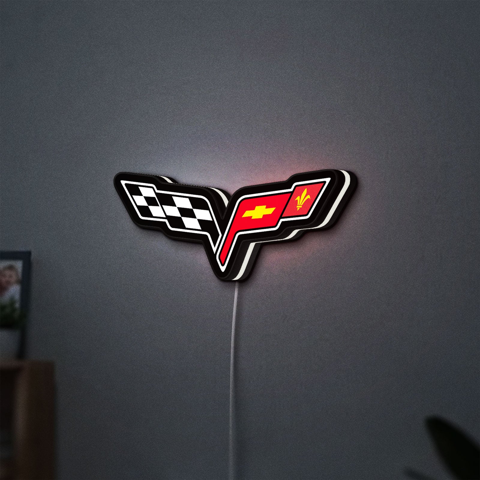 Corvette C6 LED lightbox hanging on a wall with white glow