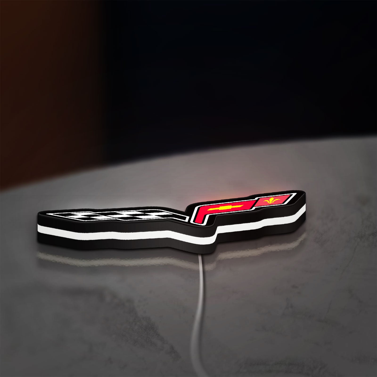 Corvette C6 LED lightbox lying flat on a desk with white glow