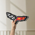 Unlit Corvette C6 LED lightbox held by hand to show size and details