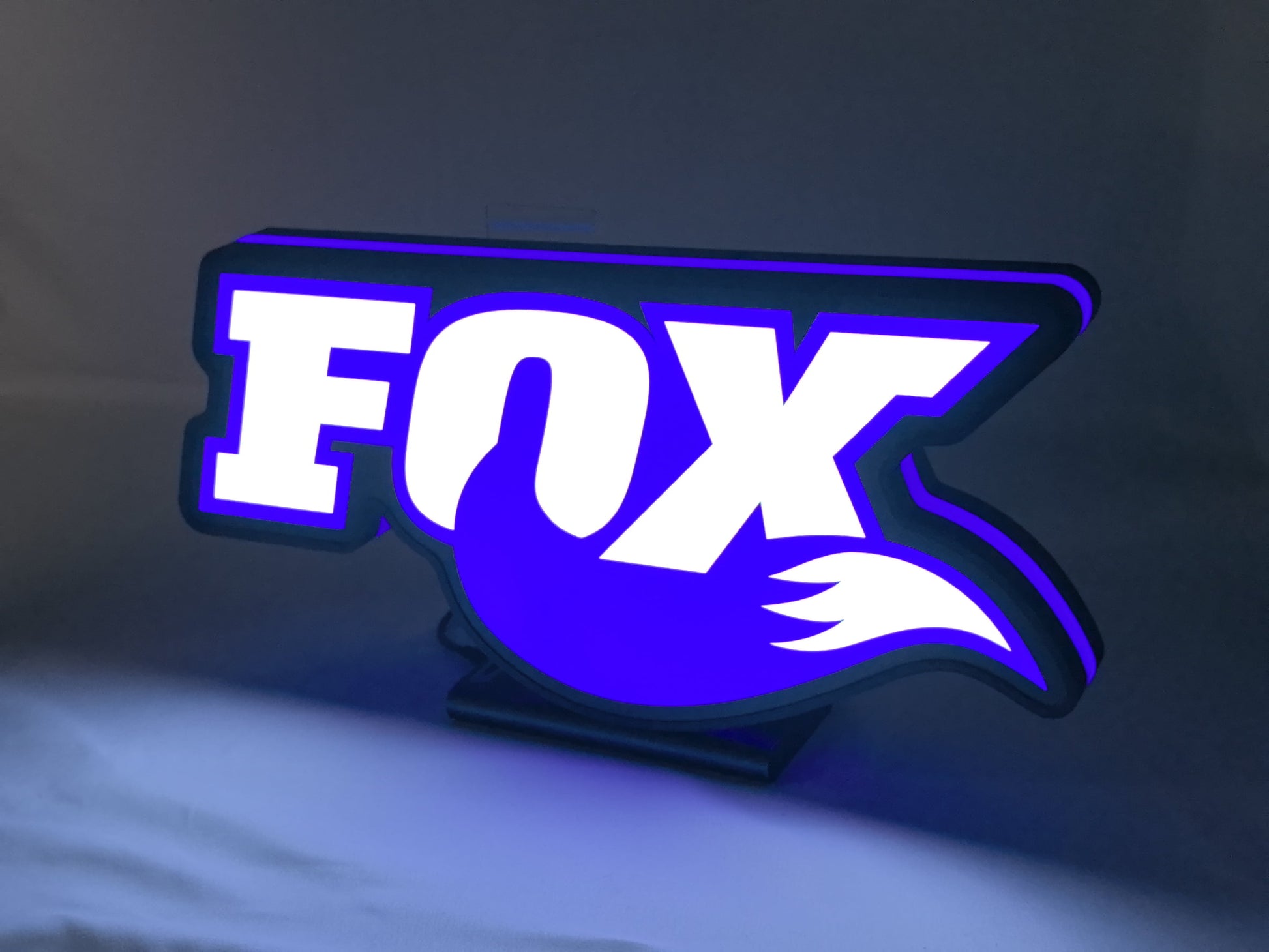 Fox Racing Shox LED Sign (40cm) - Illuminated angled view standing, perfect for garage and man cave decor