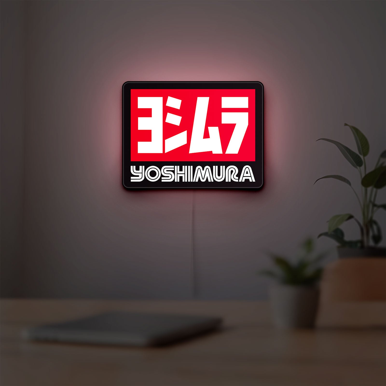 Yoshimura LED lightbox hanging on a room wall with soft red light
