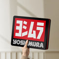 Unlit Yoshimura LED lightbox held by hand to show size and details
