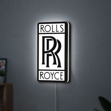 Rolls-Royce LED lightbox hanging on a wall with white glow