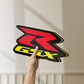 Unlit Suzuki GSX-R LED lightbox held by hand to show size and details