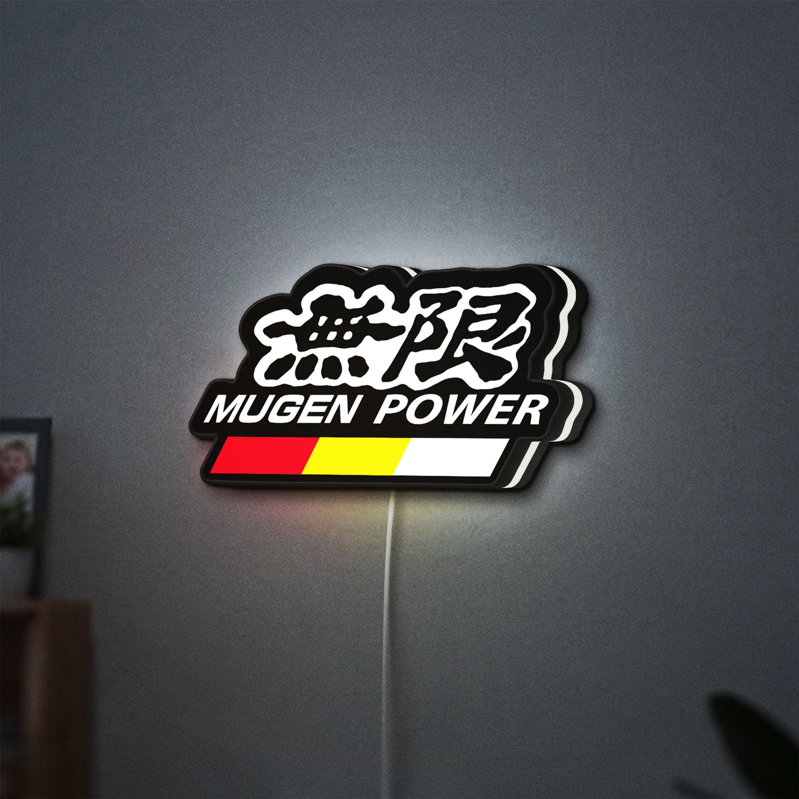 Mugen LED lightbox hanging on a wall with white glow
