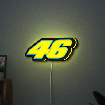 Honda 46 LED lightbox hanging on a wall with yellow glow