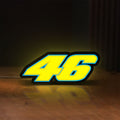 Front view of Honda 46 LED lightbox sign glowing on a wooden desk