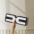 Unlit Dacia 2021 LED lightbox held by hand to show size and details