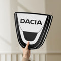Unlit Dacia LED lightbox held by hand to show size and details