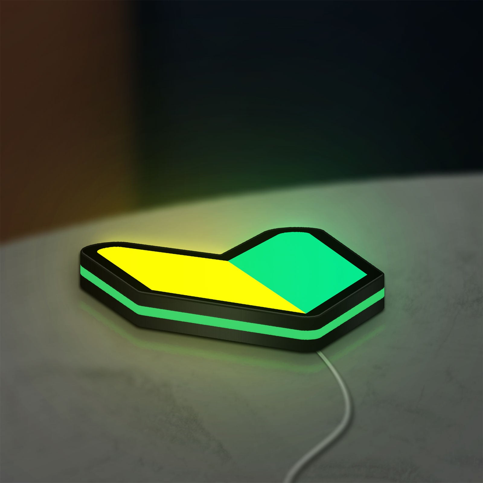 JDM Wakaba Leaf LED lightbox lying flat on a desk with green glow