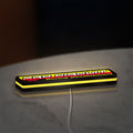 Pro Circuit Racing Development LED lightbox lying flat on a desk with yellow glow