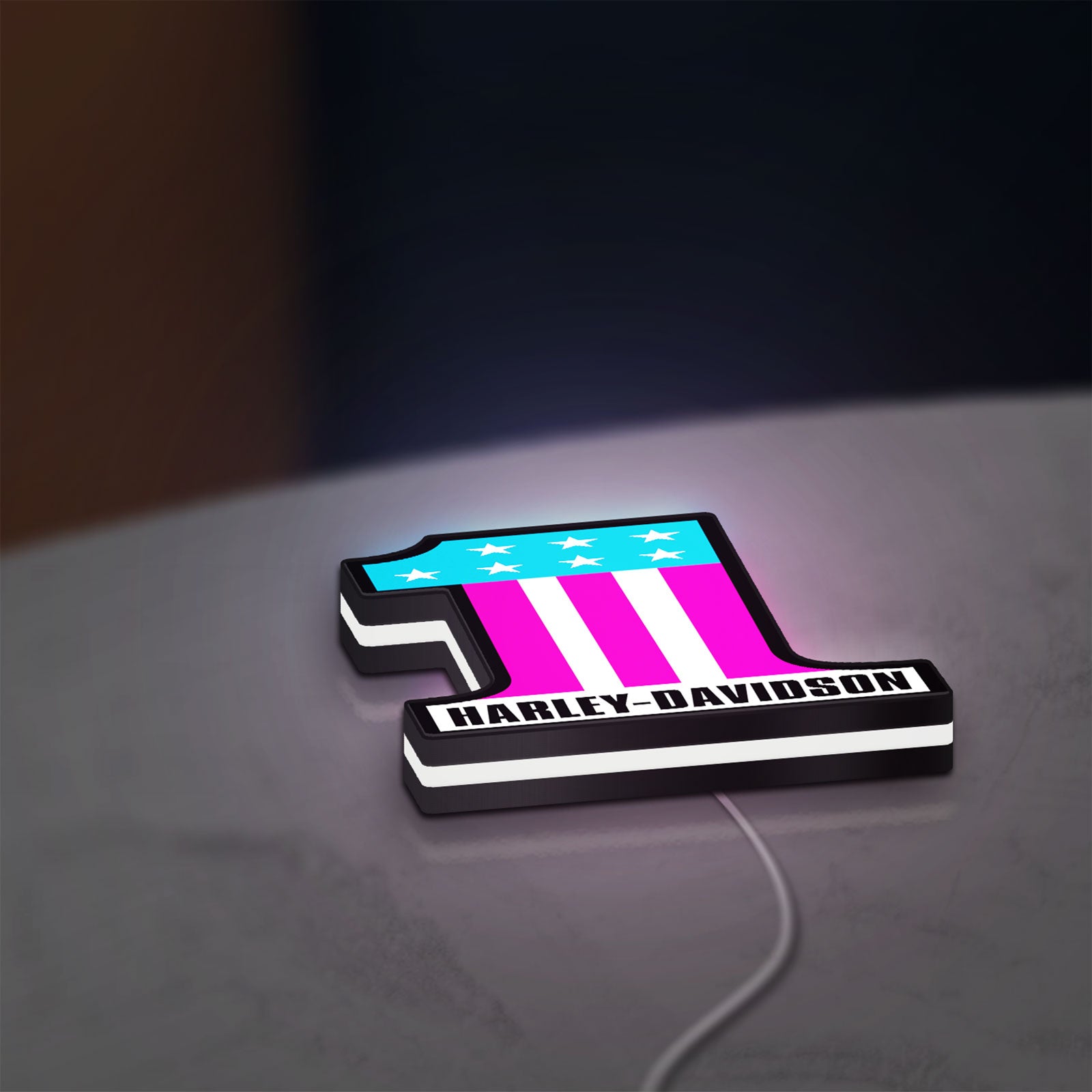 Harley #1 Patch LED lightbox lying flat on a desk with white glow