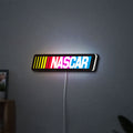 NASCAR LED lightbox hanging on a wall with white glow