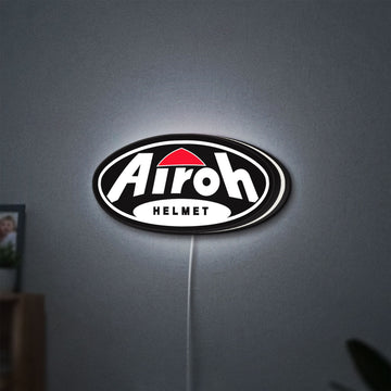 Airoh Helmet LED lightbox hanging on a wall with white glow