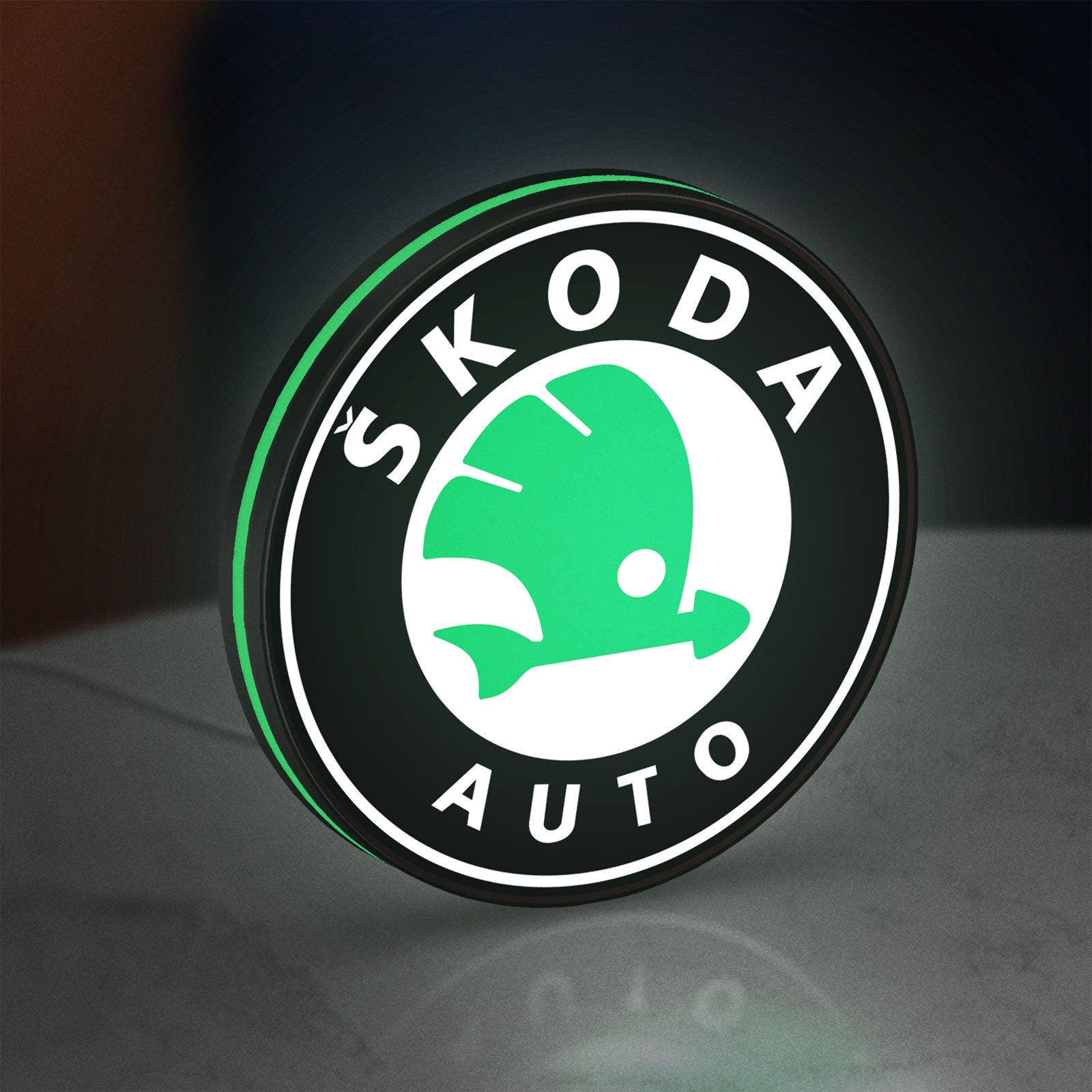 Skoda LED lightbox standing on a desk from an angled side view with green glow