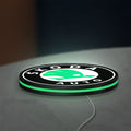 Skoda LED lightbox lying flat on a desk with green glow