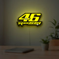 ROSSI 46 LED lightbox hanging on a room wall with soft yellow light