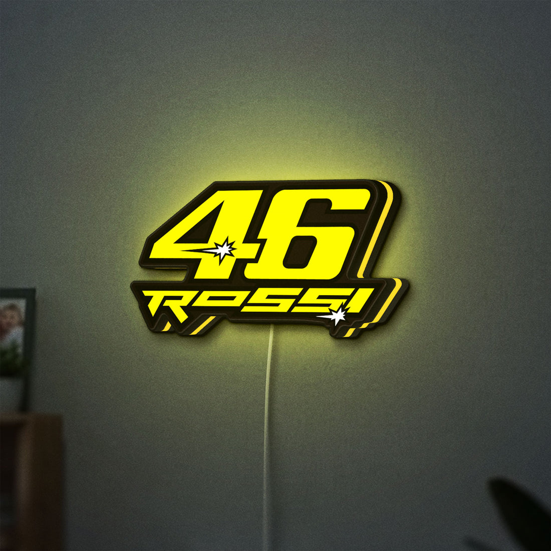 ROSSI 46 LED lightbox hanging on a wall with yellow glow