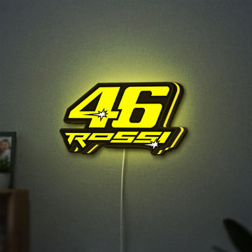 ROSSI 46 LED lightbox hanging on a wall with yellow glow