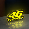 ROSSI 46 LED lightbox standing on a desk from an angled side view with yellow glow