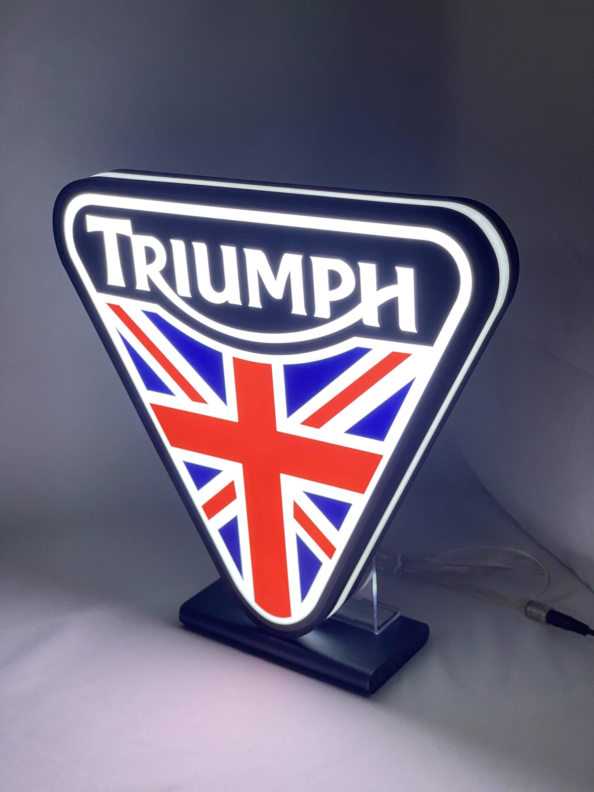 30cm Triumph 3D Printed Sign - Illuminated angled view standing, unique wall art for desk and room decor