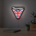 Triumph LED lightbox hanging on a room wall with soft white light