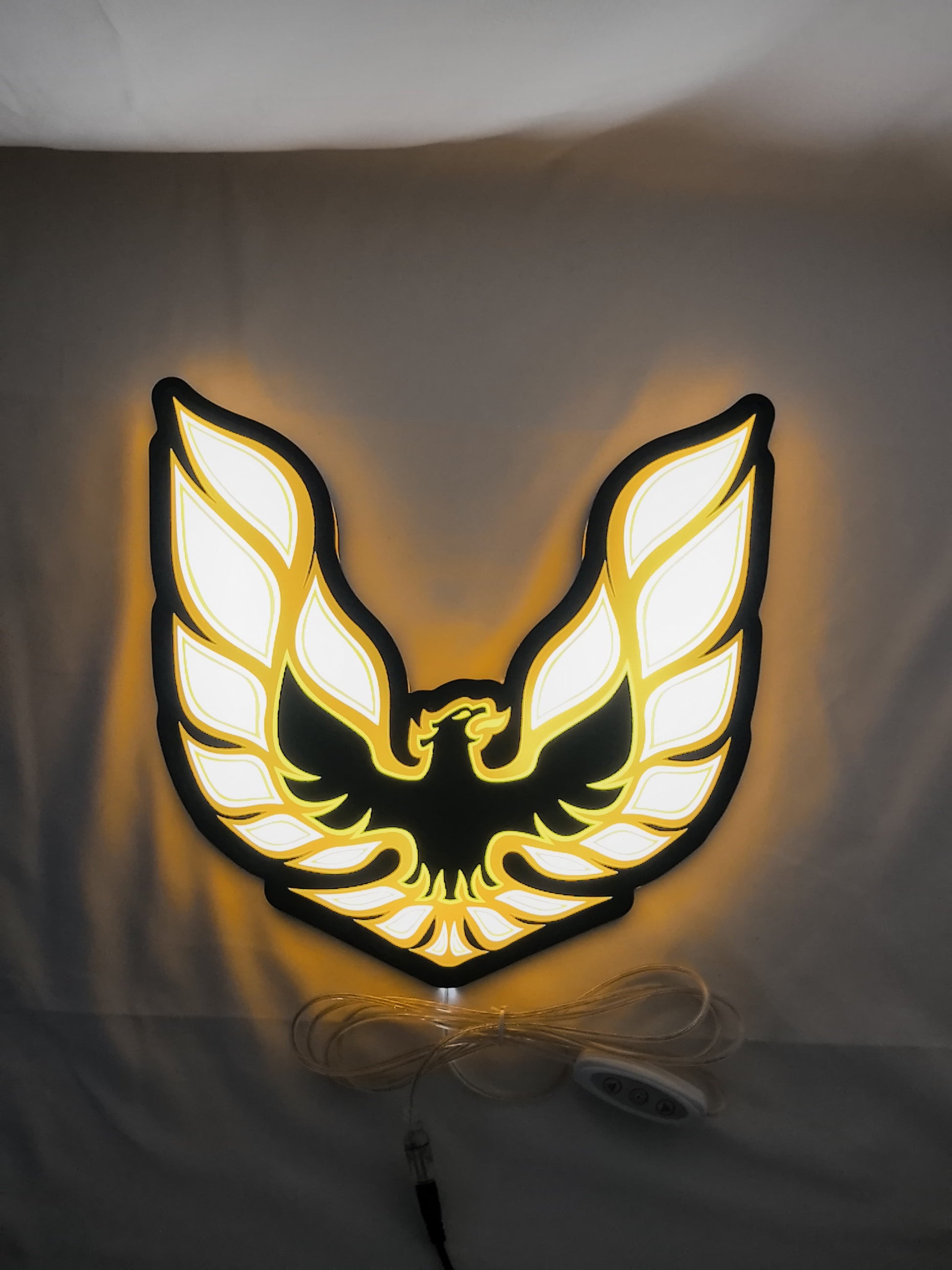 30cm Pontiac Firebird 1977 Glowing Wall Art - Illuminated flat lay front view, perfect for garage and man cave decor