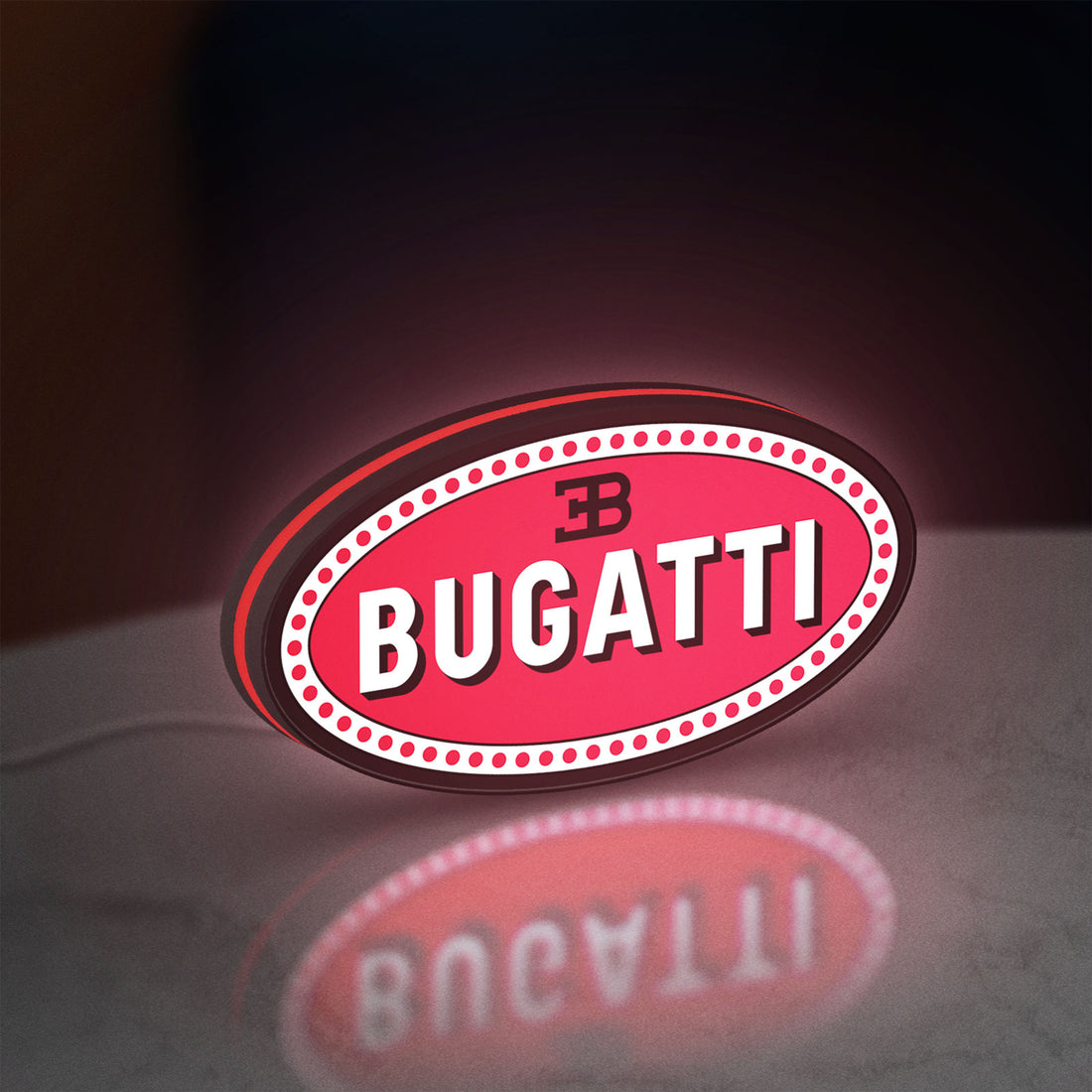 Bugatti LED lightbox hanging on a wall with red glow