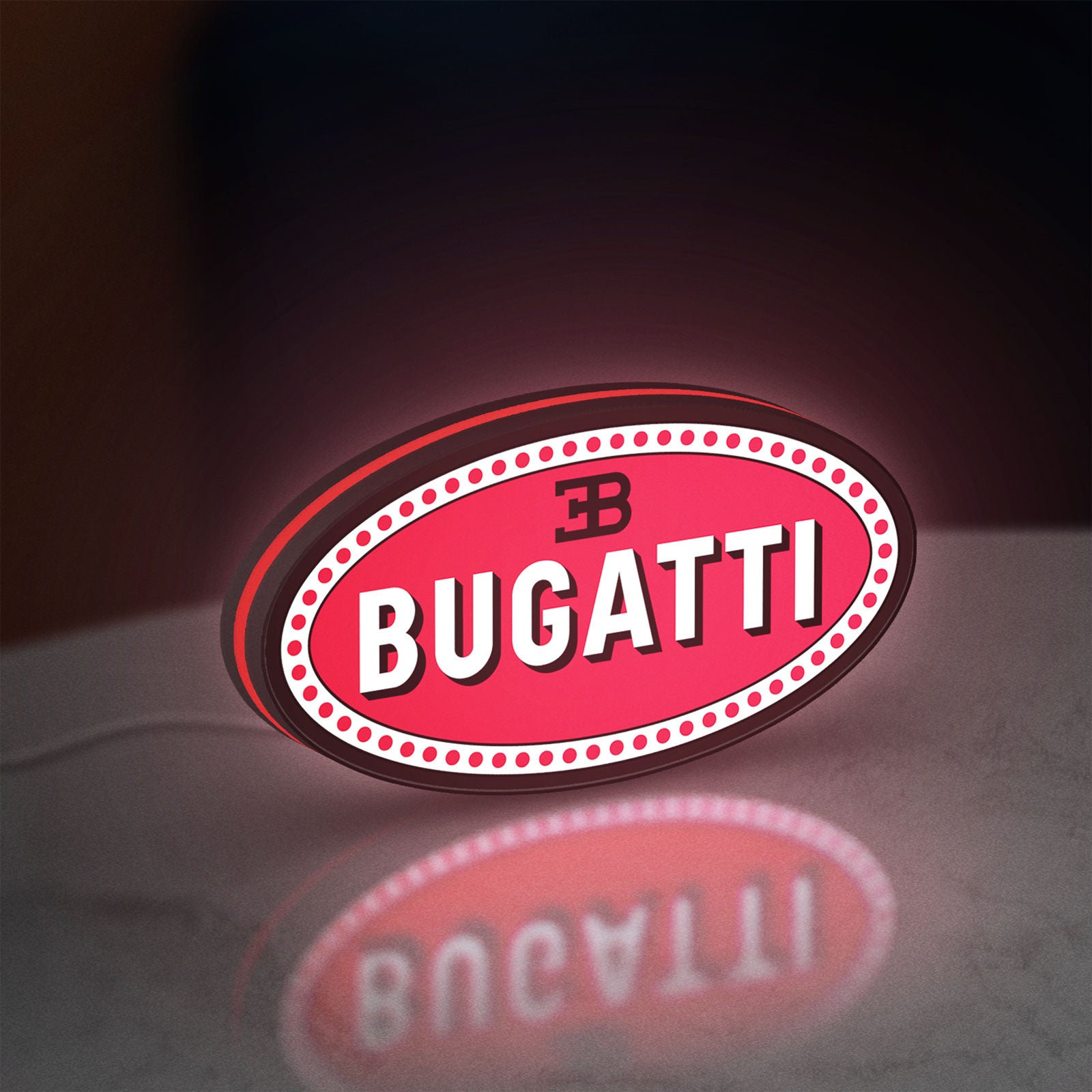 Bugatti LED lightbox standing on a desk from an angled side view with red glow